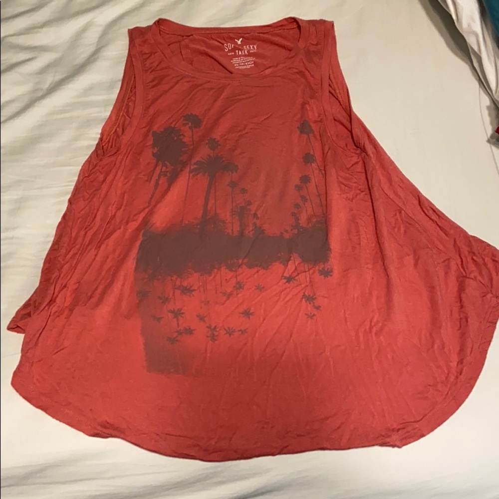 Two graphic soft and sexy tanks